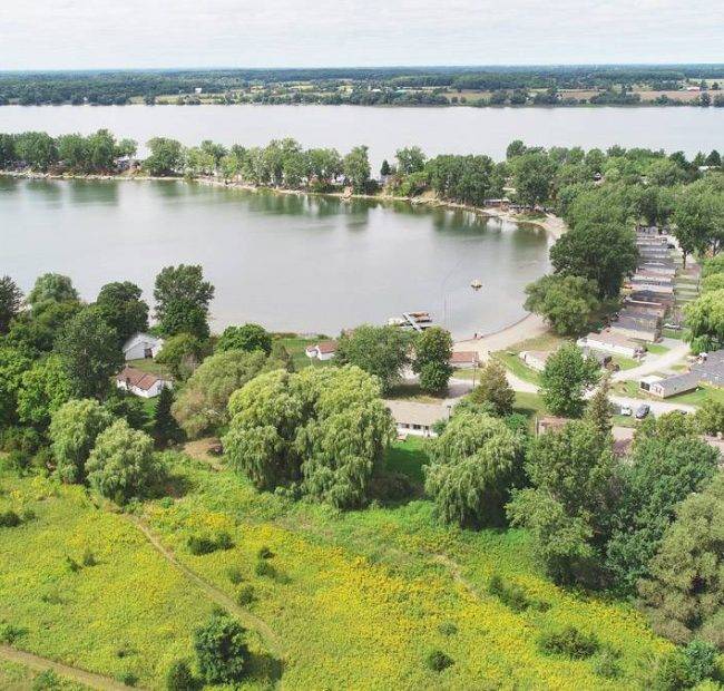 Aerial View of Cherry Beach Resort including 1200 feet of Pristine Sandy Beach on the Shore of East Lake