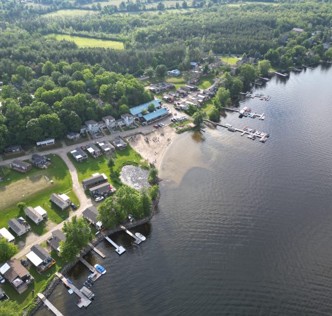 McCreary's Beach Resort - Aerial Photo of Lakeside Resort, Marina, Beach, Mississippi Lake & Surrounding Area