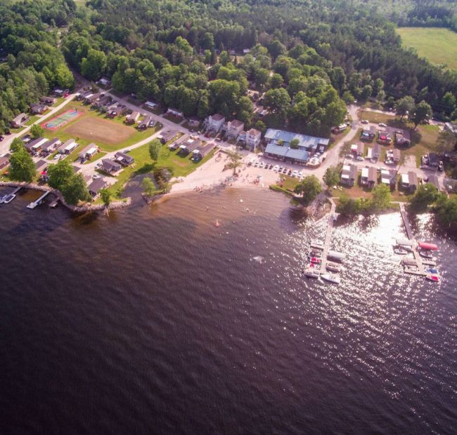 McCreary's Beach Resort - Aerial Photo of Lakeside Resort, Marina, Beach, Mississippi Lake & Surrounding Area