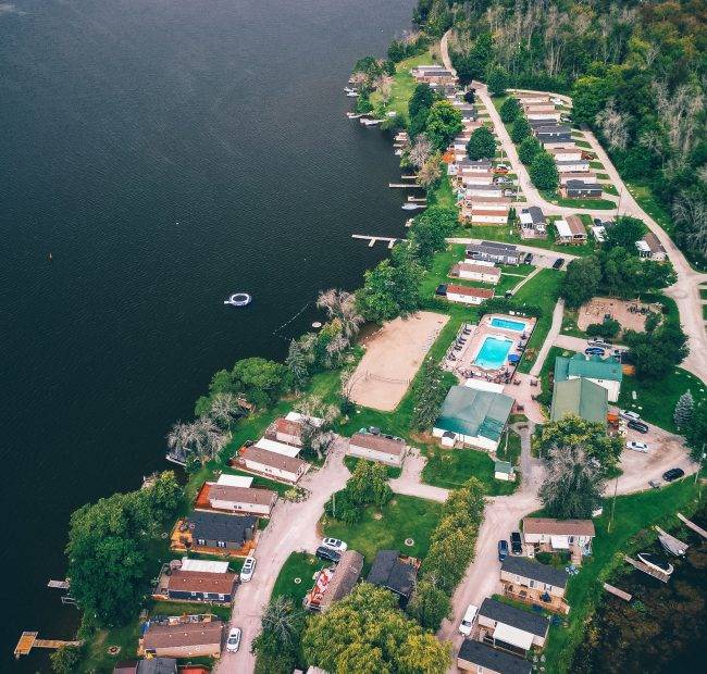 Woodland Estate Resort | Aerial view of the lakeside resort, Lake Seymour and surrounding Kawartha nature