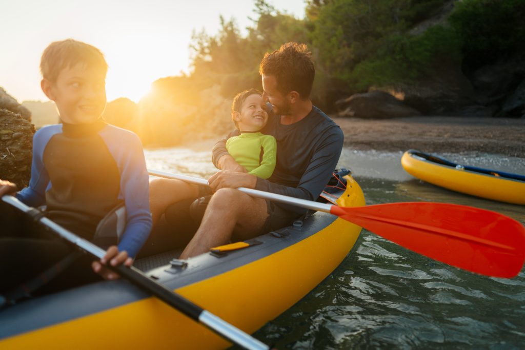Happy family Kayaking
